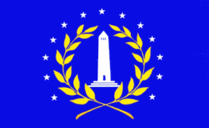 flag of st bernard parish with blue background, white obelisk at center surrounded by yellow leaves and branches and white stars