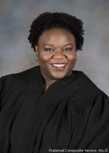 portrait of karlie wells in graduation gown