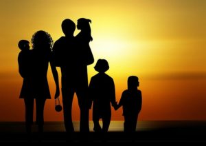 silhouette of family during sunrise