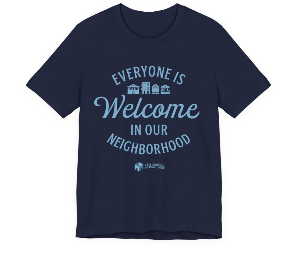 Dark purple t-shirt with the phrase everyone is welcome in our neighborhood written on the front in light blue. The louisiana fair housing action center logo is below the text.